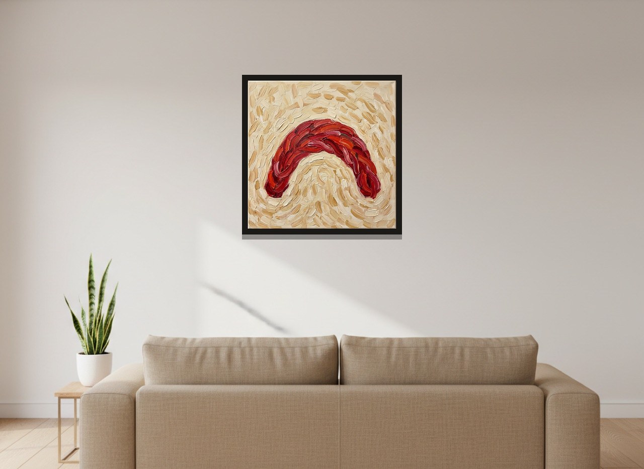 The framed piece hanging on a living-room wall